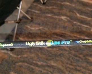 3 fishing rods, 2 w/reels. Ugly Stiks