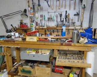 TONS OF TOOLS AND WORK BENCHES