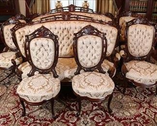 073 -Magnificent 8 piece rosewood parlor suit with beautiful new period style upholstery by George Henkel, NY, Sofa - 24 in. T, 84 in. W, 26 in. D., Chair - 42 in. T, 27 in. W, 24 in. D.