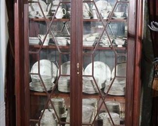 092 - Mahogany Empire column front china cabinet, 68.5 in. T, 50 in W, 16 in. D.