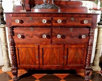 081 - Mahogany Empire sideboard with acanthus carving on front, glass pulls and backsplash, 58 in. W, 23 in. D.