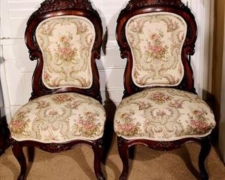 055 - Carved laminated parlor chairs with beautiful period style upholstery, attrib. to Belter, 36.5 in T. 20 in. W, 18 in. D.