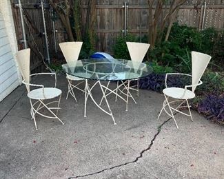 Amazing mid century outdoor (or indoor!) Minimalist Geometric Metal Table & 4 Chairs… hand-wrought triangle backs and round bases with hand done designs… this set is amazing. Despite intense research, we could not find any info on the designer or producer… but it had to be the coolest vintage outdoor set we’ve ever had the pleasure of getting to find a home. We left it exactly as found, but repainting or powder coating it would be super easy if you want. 4 chairs are pictured… there are 2 more included… but their condition is not as great. Was $1800… now looking for $900 or really close