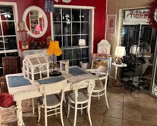 Love this white table and 7 unique chairs!