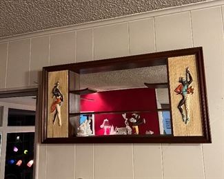 TOTALLY Rad mid century modern mirrored wall curio cabinet! This thing totally makes a room or space!