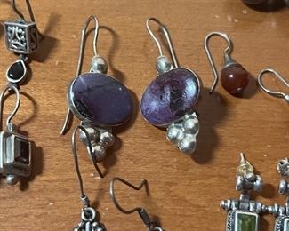 I believe these are sugilite or charoite. Not sure though.