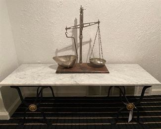 Heavy wrought iron base with solid white marble top coffee cocktail table.  Vintage scale 