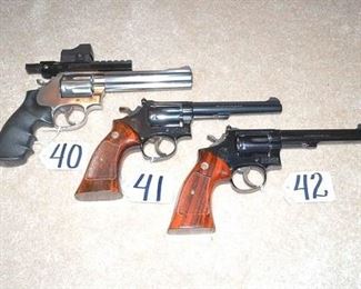 #40 S&W Mod 686-4 revolver w/Holo sight 357 mag cal
#41 S&W Mod 17-3 revolver 22 cal
#42 S&W Mod 14 revolver 38 S&W