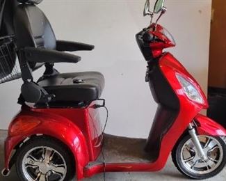 Like new condition 2018 E Wheels Power Scooter with cover and charger. New batteries 