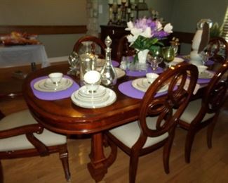 Beautiful Dining Table and Six Matching Chairs - Dish Set on Display
