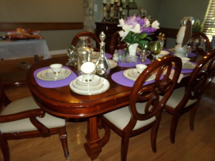 Beautiful Dining Table and Six Matching Chairs - Dish Set on Display