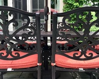 Detail
Frontgate
Oval Dining Table & 6 Arm Chairs 
Cast Aluminum Onyx Finish
Includes Umbrella with Stand & Sunbrella Cushions
SO LD