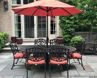 Frontgate
Oval Dining Table & 6 Arm Chairs 
Cast Aluminum Onyx Finish
Includes Umbrella with Stand & Sunbrella Cushions
SOLD