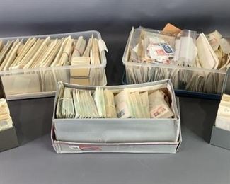 Large box of cancelled stamps, too many to count. Stamps come in protective envelopes. Includes stamps like 1962 Christmas, The American Woman, and many more! See photos for details.