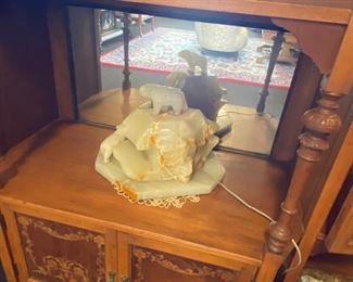 Lighted carved marble polar bear sculpture.