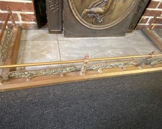 Ornate antique bronze fireplace bumper.