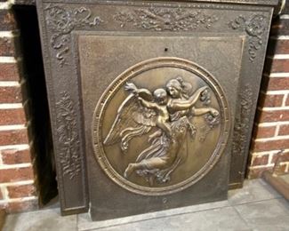 Beautiful antique fireplace cover.