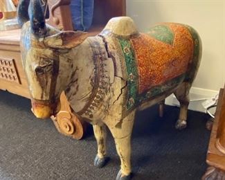 Heavy antique painted wood donkey.