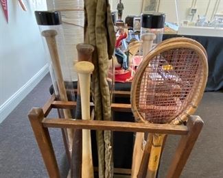 JSA authenticated baseball bats, vintage tennis rackets and a vintage bamboo fishing pole.