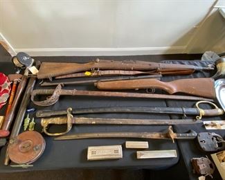 Top piece is a 1903 Springfield, second is a Corpsman 160 Pellgun.