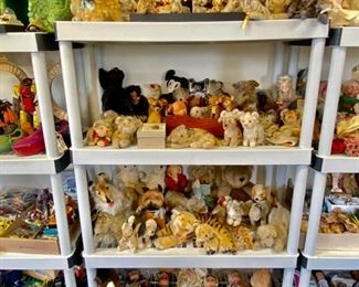A whole slew of Steiff stuffed animals, as well as other collectibles.