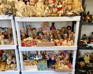 Antique and vintage dolls, as well as some American Girl Doll pieces.