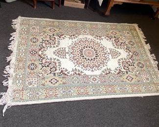 Hand-knotted wool rug from Iran.