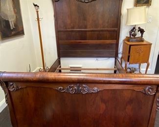 Victorian walnut 3/4-size high-back bed.