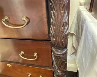 Empire carved column chest.