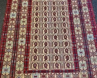Hand-knotted wool Afghan rug.