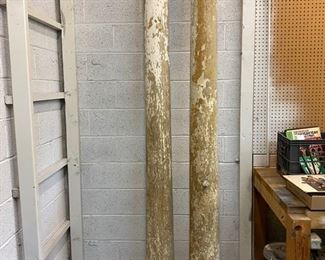 Pair of distressed wood columns, approximately 9' tall.