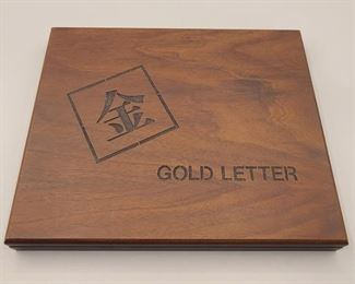 Gold letter