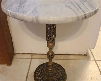 Marble top w/heavy brass pedestal 
*we have two