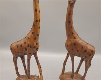 Wooden giraffe family
