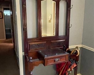 Antique Art Nouveau Hall Tree, center mirror, drawer and umbrella storage, just beautiful. 