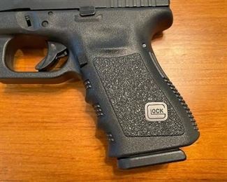 This Glock comes with two magazines, the original case, and the owner's manual. We have more magazines if you need'em.