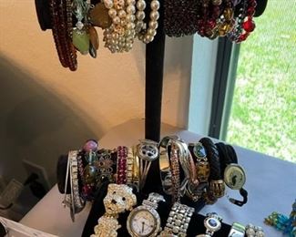 Lots of costume bracelets, and great ladies watches
