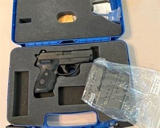 The Sig comes with the original case and 3 magazines. It is also equiped with a Crimson Trace Laser Grip Model # LG-439!