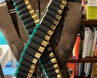 The bandoliers are loaded with 12 gauge 00 Buck.