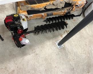 Here's a gas powered auger that has never been used! 