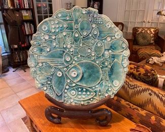 Large ceramic, glazed, fish piece with stand