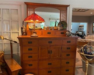 Arts and Craft style buffet with lots and lots of storage and great mirror, wonderful stained glass table lamp, stained glass accent lights, ceramic pieces
