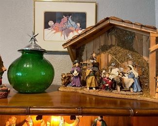 Nativity, art glass and in the background Amado M Pena print