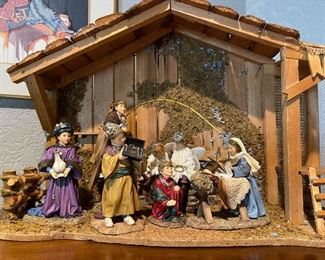 A close look at the nativity with children representing the characters.