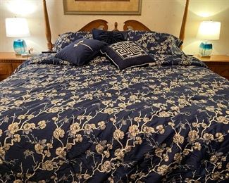 Beautiful King comforter with matching shams. The cushions go with a bed skirt designed by Tim Gunn