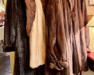 Three of the fur items we have. The brown swing coat is an Anne Klein fur, and the full length ranch mink is by furrier Raffaella (currently in Milan, Baton Rouge, and Lafayette). 