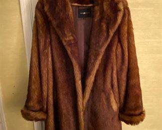 Faux Fur coat (it’s really a man’s coat but we are sure the lady of the house bought this fun coat for herself