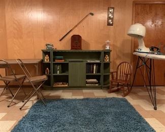 Child's maple rocking chair, Folding chairs (2), folding card table, decorative painted irons (3), ironing board, steam iron, hair dryer, shag area rug, Taylor temp/humidity/barometer weather station, old-style AM/FM radio w/cassette. (SORRY: Decoupage bookcase not available, SOLD, DISPLAY ONLY)