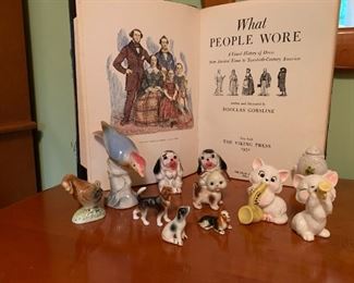 Book "What People Wore" (1952) with multiple pictures, 1950's china figurines