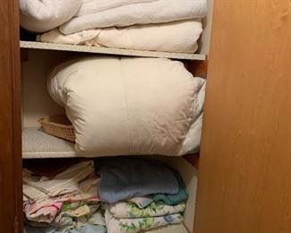 Linens: towels, sheets, mattress covers for twin and full-sized beds